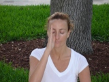 Sit in a cross leg position and close the right nostril  with the right thumb